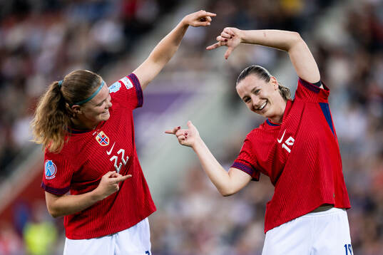 Signe Gaupset of Norway celebrates with Elisabeth Terland