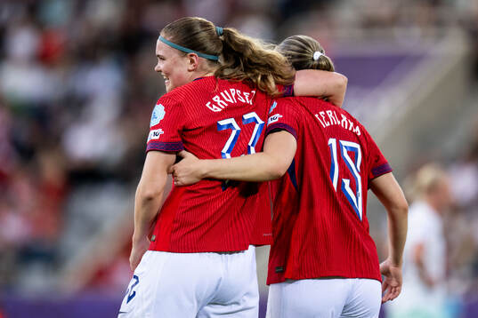 Signe Gaupset of Norway celebrates with Elisabeth Terland