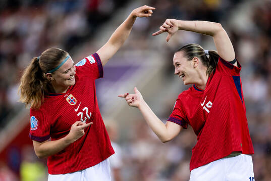 Signe Gaupset of Norway celebrates with Elisabeth Terland