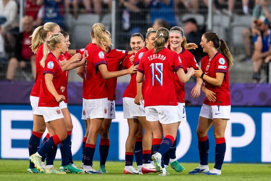 Signe Gaupset of Norway celebrates celebrates with team