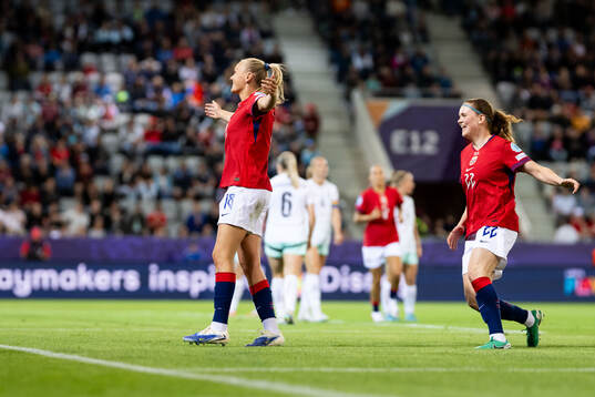Frida Maanum of Norway celebrates with Signe Gaupset