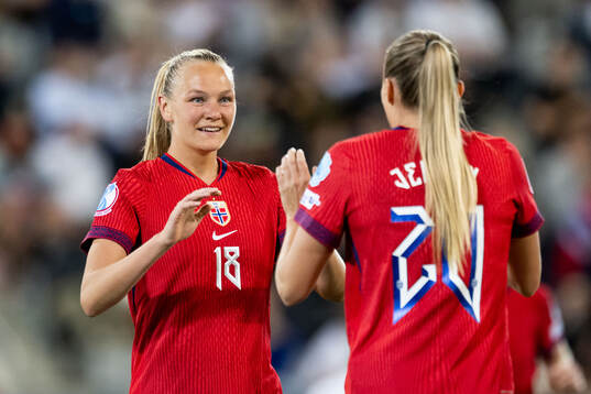 Frida Maanum of Norway celebrates with Synne Sofie Kinden