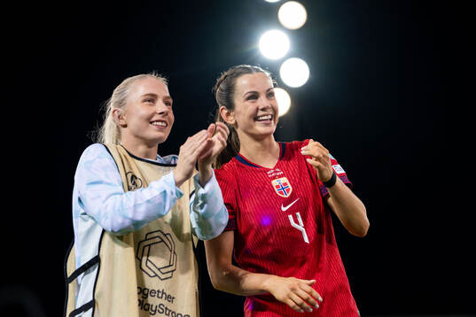 Thea Bjelde and Tuva Hansen of Norway celebrate