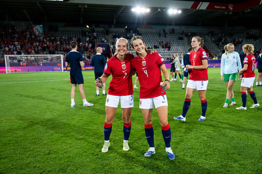 Emilie Woldvik and Tuva Hansen of Norway celebrate