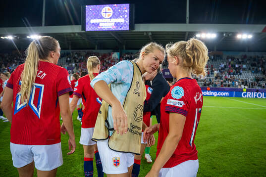 Ada Hegerberg and Justine Kielland of Norway celebrate