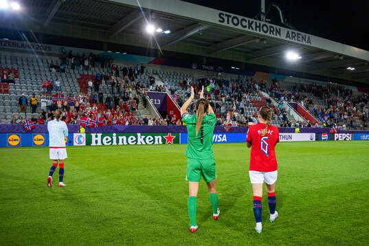 Goalkeeper Cecilie Fiskerstrand and Maren Mjelde of Norway