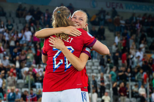 Signe Gaupset and Frida Maanum of Norway celebrate