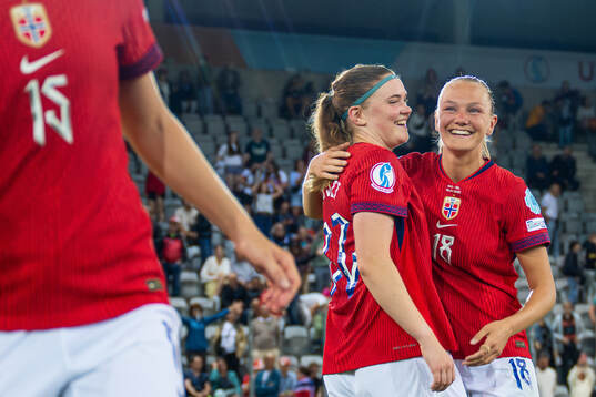 Signe Gaupset and Frida Maanum of Norway celebrate