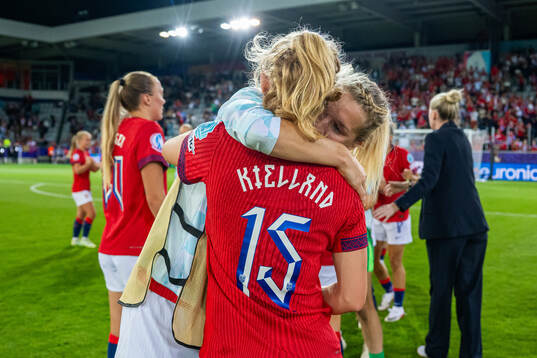 Justine Kielland and Ada Hegerberg of Norway celebrate