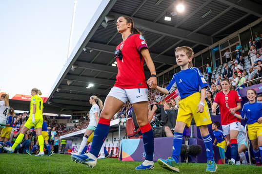 Tuva Hansen of Norway enters the pitch wearing a GoPro