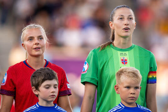 Emilie Woldvik and goalkeeper Cecilie Fiskerstrand of