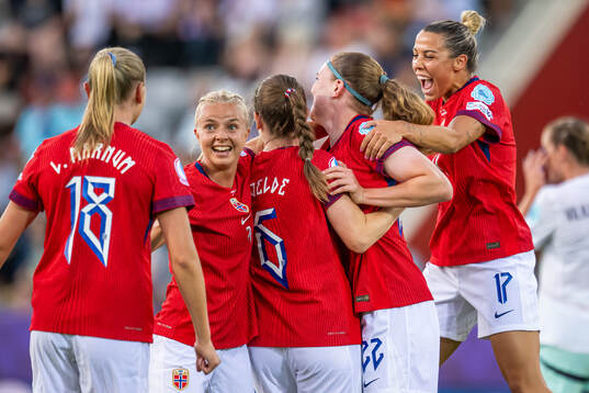 Signe Gaupset of Norway celebrates with teammates Emilie