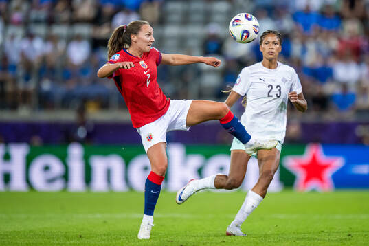Marit Bratberg Lund of Norway and Sveindis Jonsdottir of