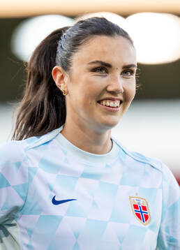 Ingrid Syrstad Engen of Norway warms up
