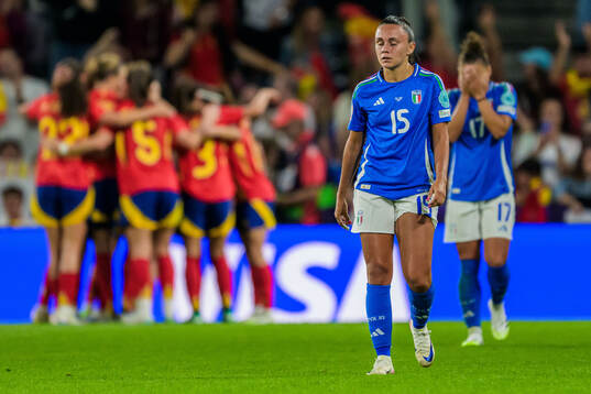 Annamaria Serturini and Lisa Boattin of Italy looks dejected