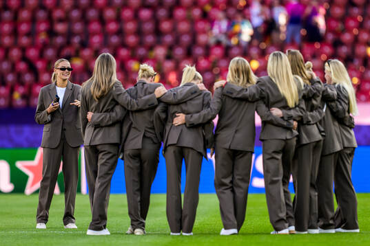Fridolina Rolfö of Sweden takes a photo of her teammates