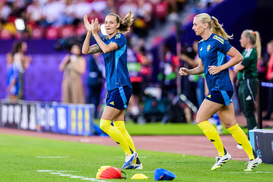 Nathalie Björn and Stina Blackstenius of Sweden
