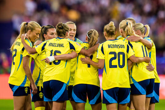 Players of Sweden celebrate