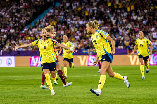 Kosovare Asllani and Fridolina Rolfö of Sweden celebrates