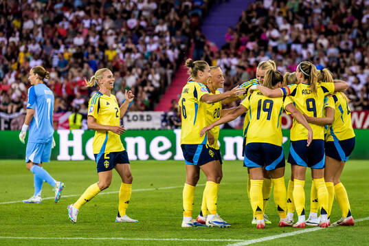 Players of Sweden celebrate