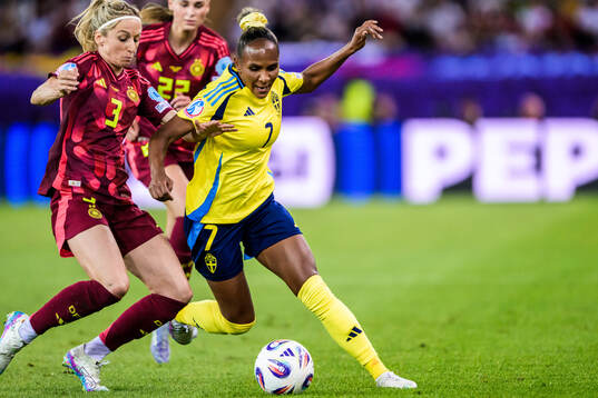 Kathrin Hendrich of Germany and Madelen Janogy of Sweden