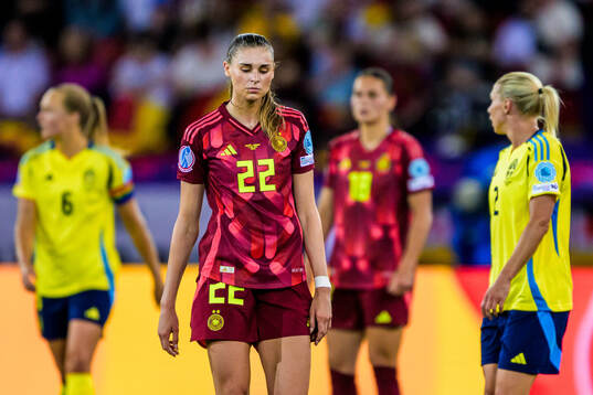 Jule Brand of Germany looks dejected