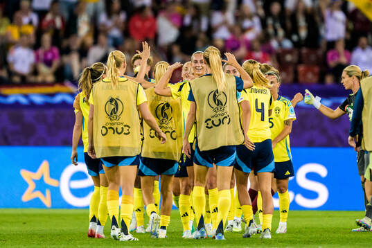 Players of Sweden celebrate