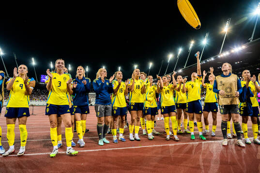 Players of Sweden celebrate