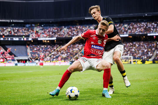 Degerfors Sebastian Ohlsson och AIKs Yannick Geiger