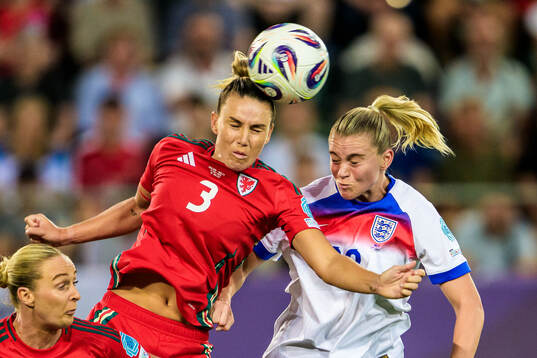 Gemma Evans of Wales and Alessia Russo of England