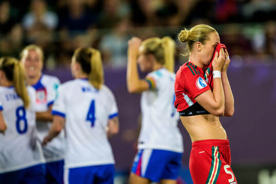 Rhiannon Roberts of Wales looks dejected