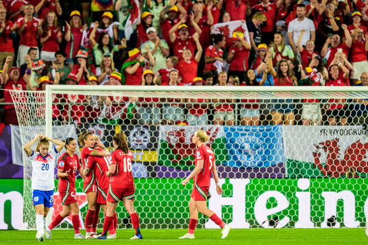 Hannah Cain of Wales celebrates