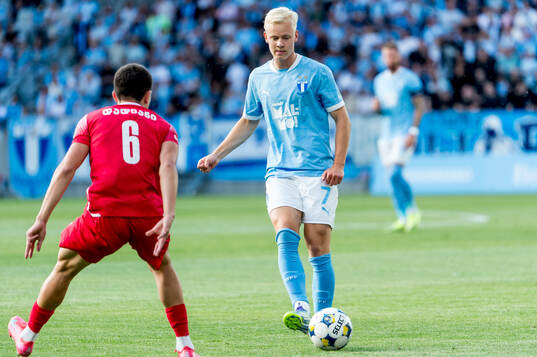 Nikoloz Dadiani of FC Iberia and Otto Rosengren of Malmö FF