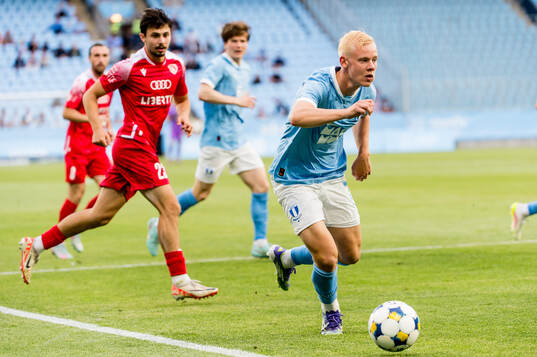 Otto Rosengren of Malmö FF and Giorgi Tabatadze of FC