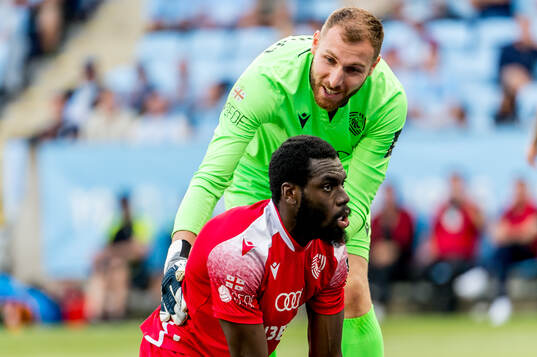 Derek Agyakwa and Giorgi Makaridze of FC Iberia
