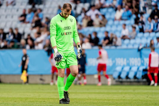 Giorgi Makaridze of FC Iberia looks dejected