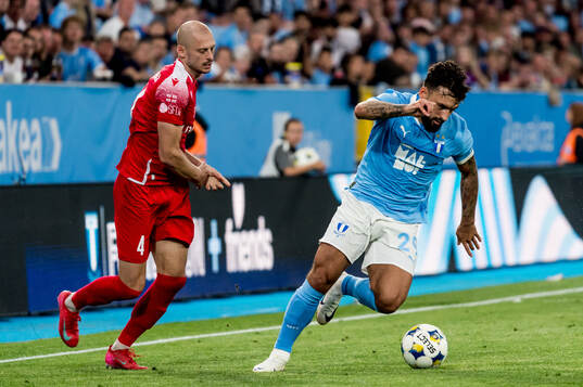 Sead Haksabanovic of Malmö FF and Giorgi Jgerenaia of FC