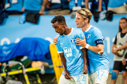 Taha Ali and Jens Stryger Larsen of Malmö FF celebrates