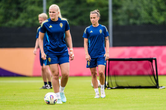 Goalkeeper Emma Holmgren and Julia Zigiotti Olme of the