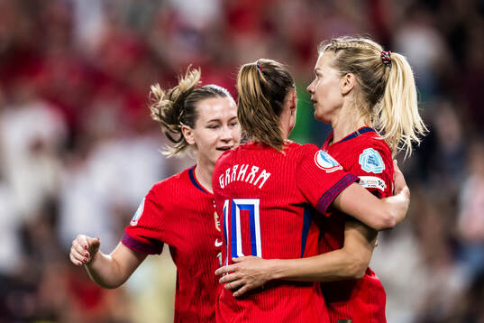 Ada Hegerberg and Caroline Graham Hansen of Norway celebrate