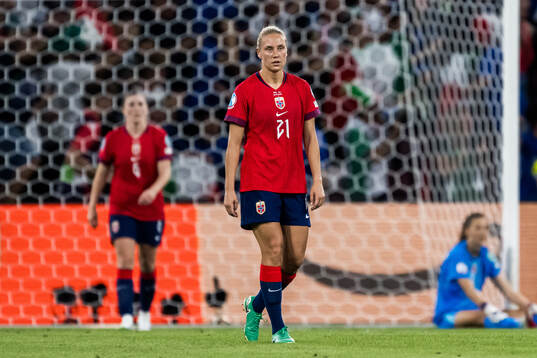 Lisa Naalsund of Norway looks dejected