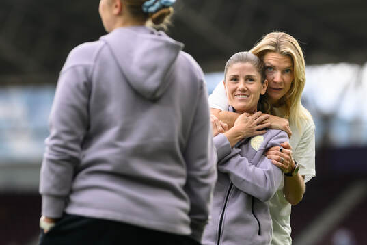Maren Mjelde and Ada Hegerberg of Norway