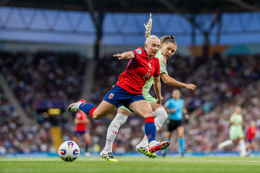 Thea Bjelde of Norway and Elena Linari of Italy