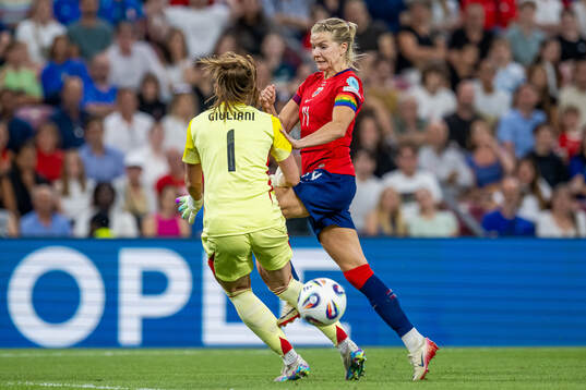 Ada Hegerberg of Norway scores the 1-1 goal past goalkeeper