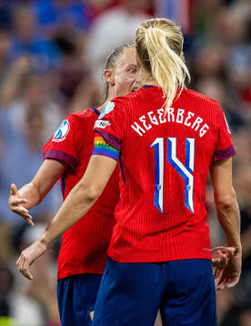 Ada Hegerberg of Norway celebrates with teammate Caroline