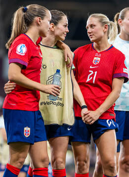 Guro Reiten, Tuva Hansen and Lisa Naalsund of Norway look