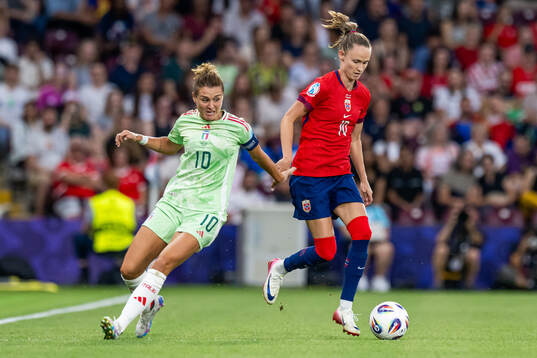 Cristiana Girelli of Italy and Caroline Graham Hansen of