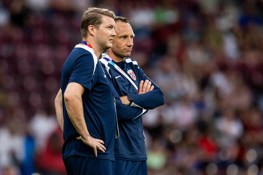 Masseur Marius Eriksrud and coach Terje Skjeldestad of