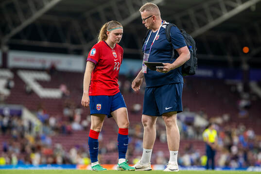 Signe Gaupset and media officer Henning Sverdrup of Norway