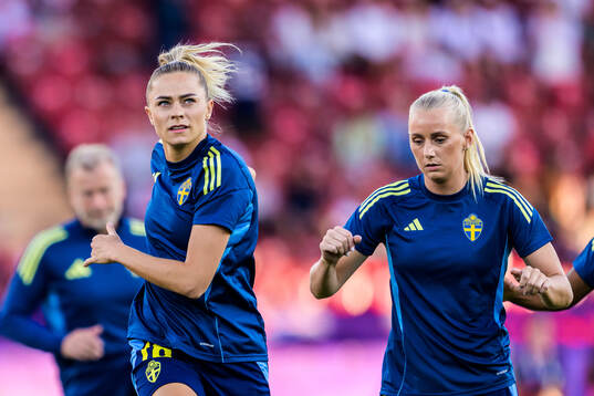 Fridolina Rolfö and Stina Blackstenius of Sweden